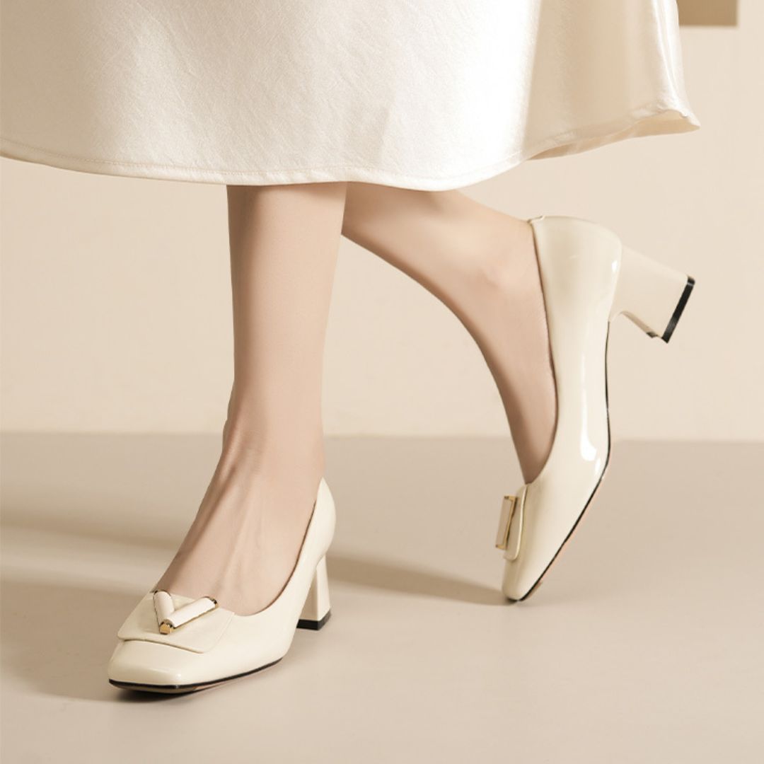 Pure Poise white block office heel by Ozzaro