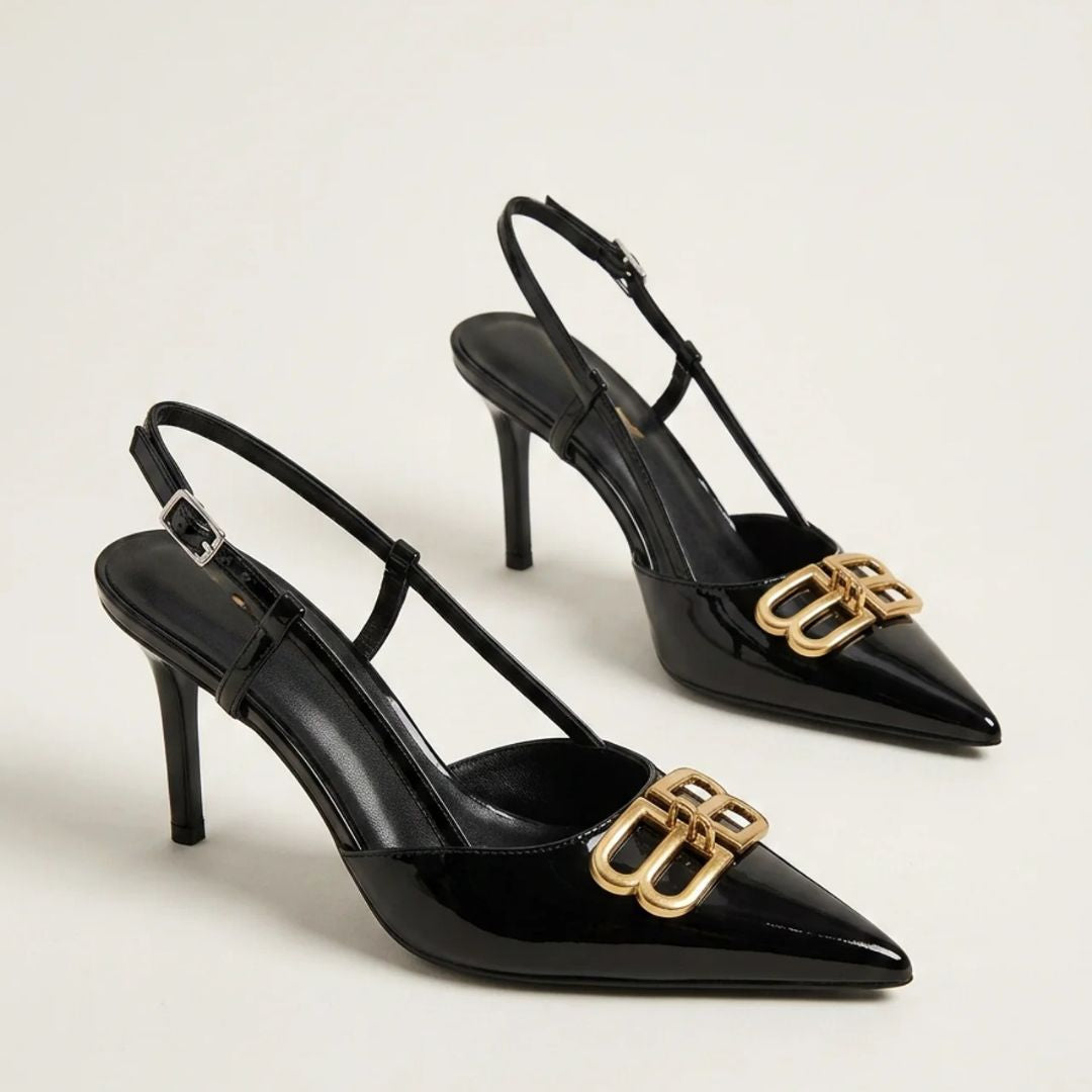 Gold Mark black gold-accent stiletto by Ozzaro