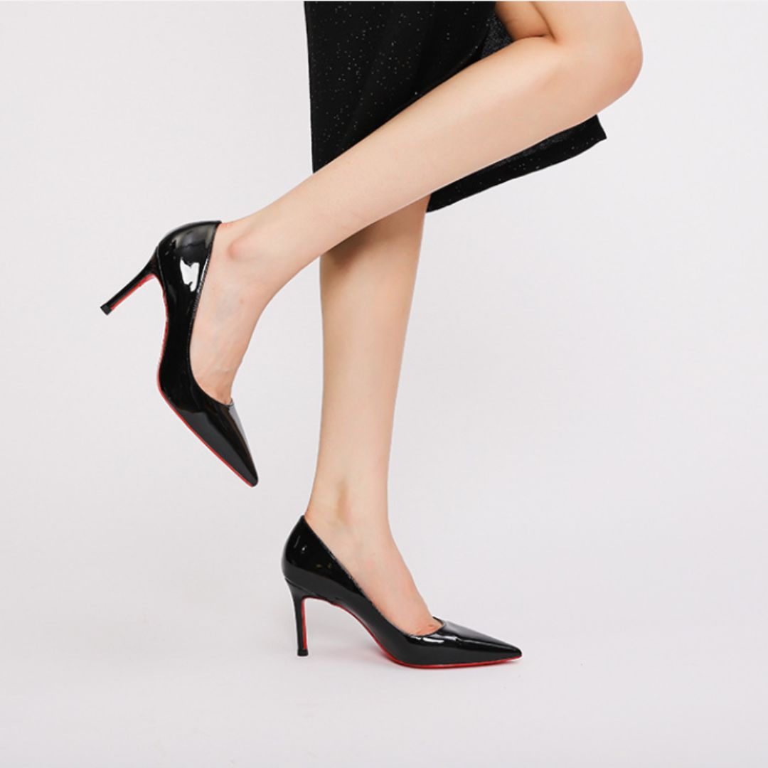 Black Pop black patent red-sole heel by Ozzaro