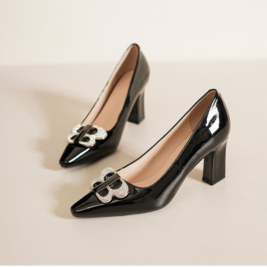 Refined Mark black block heel with brooch by Ozzaro