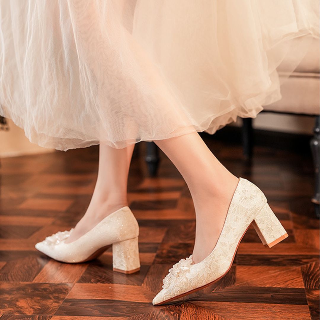 Phulkari ivory bridal heels styled for wedding reception
