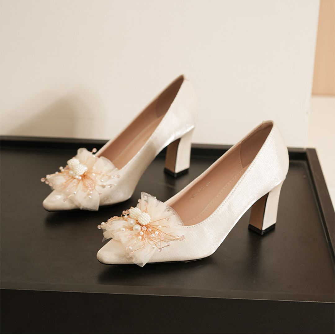 Gulbahar ivory shimmer bridal block heels with floral brooch - front view