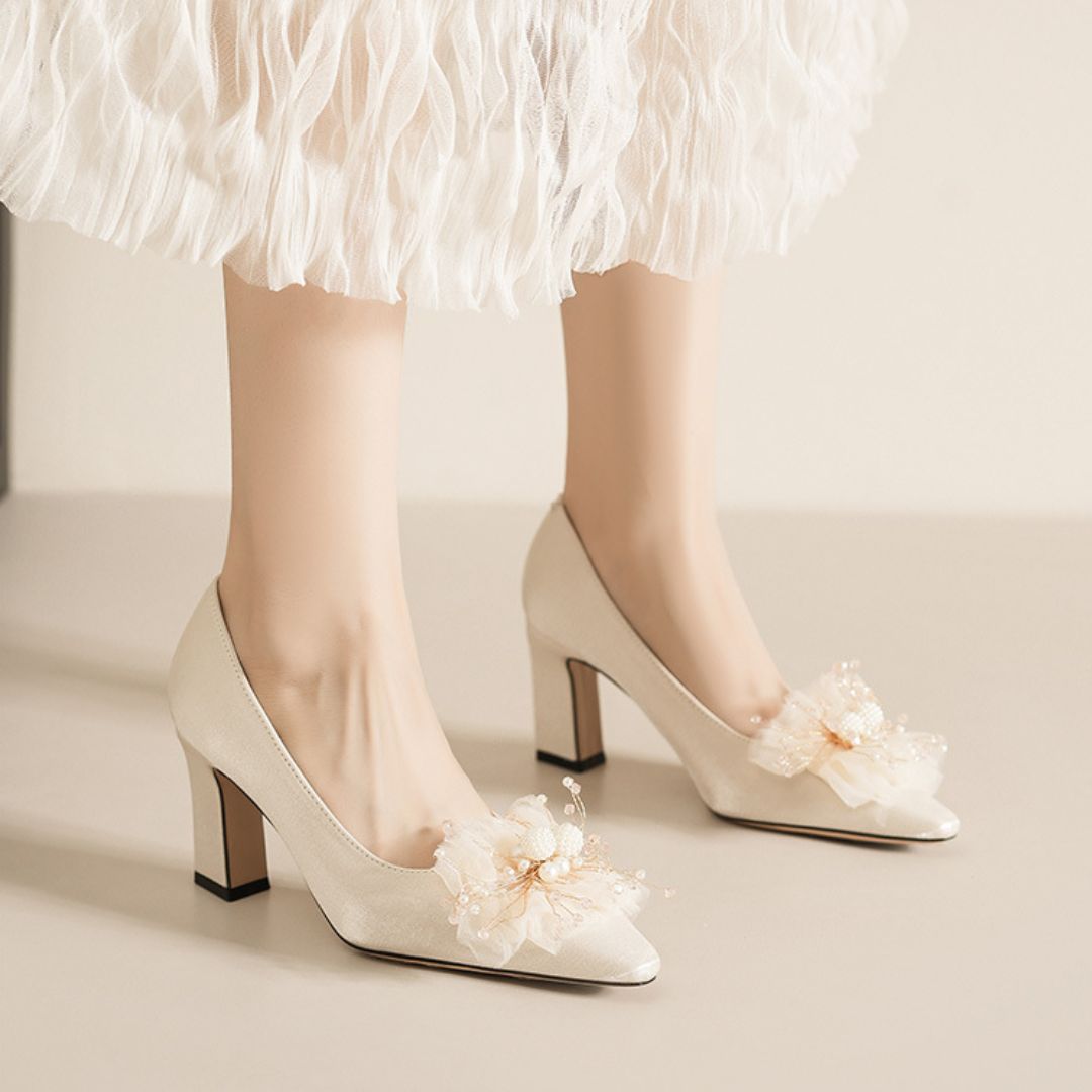 Gulbahar ivory block heel height and sole view