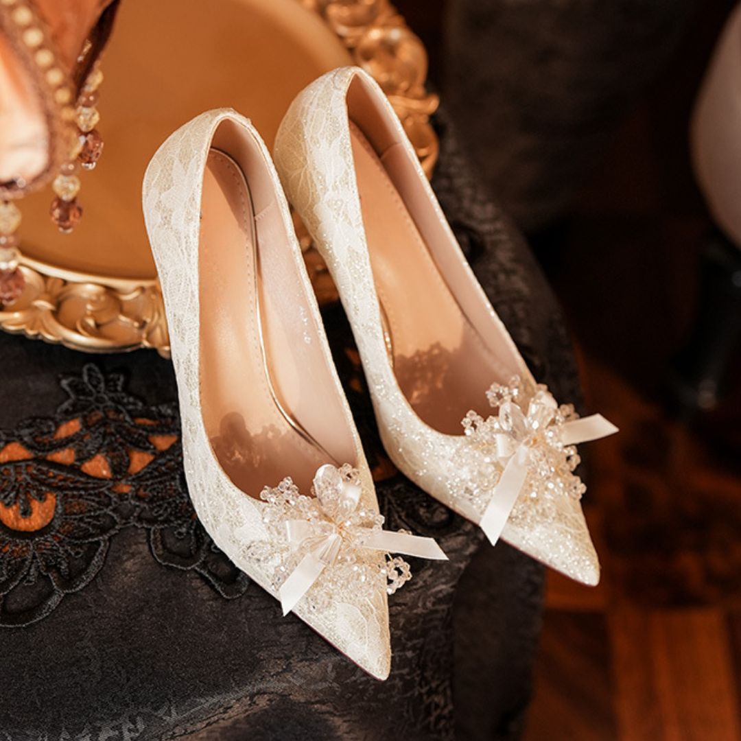 Heera Phool ivory stiletto heel height and sole view