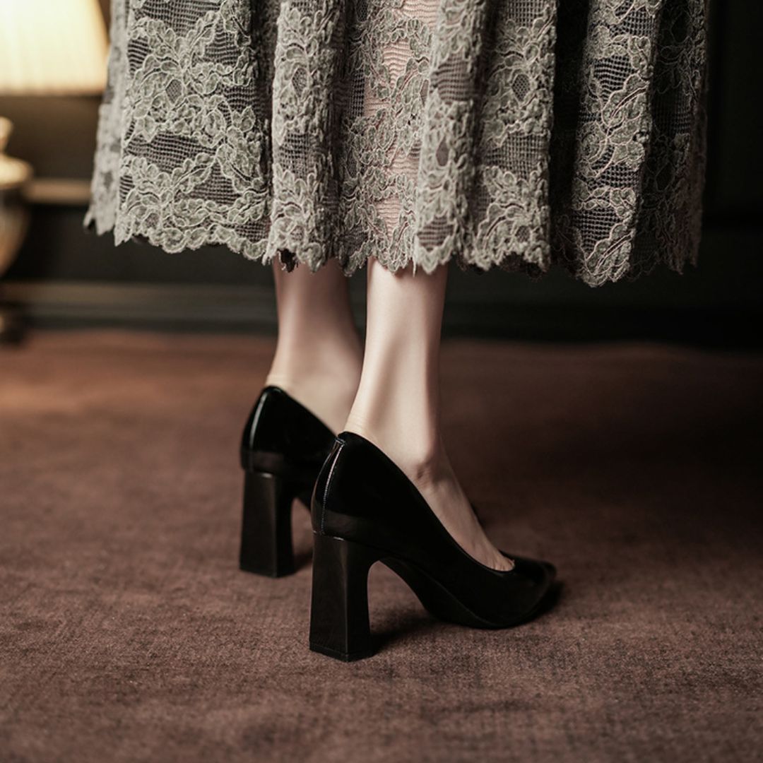 Madam black formal heels styled with office wear