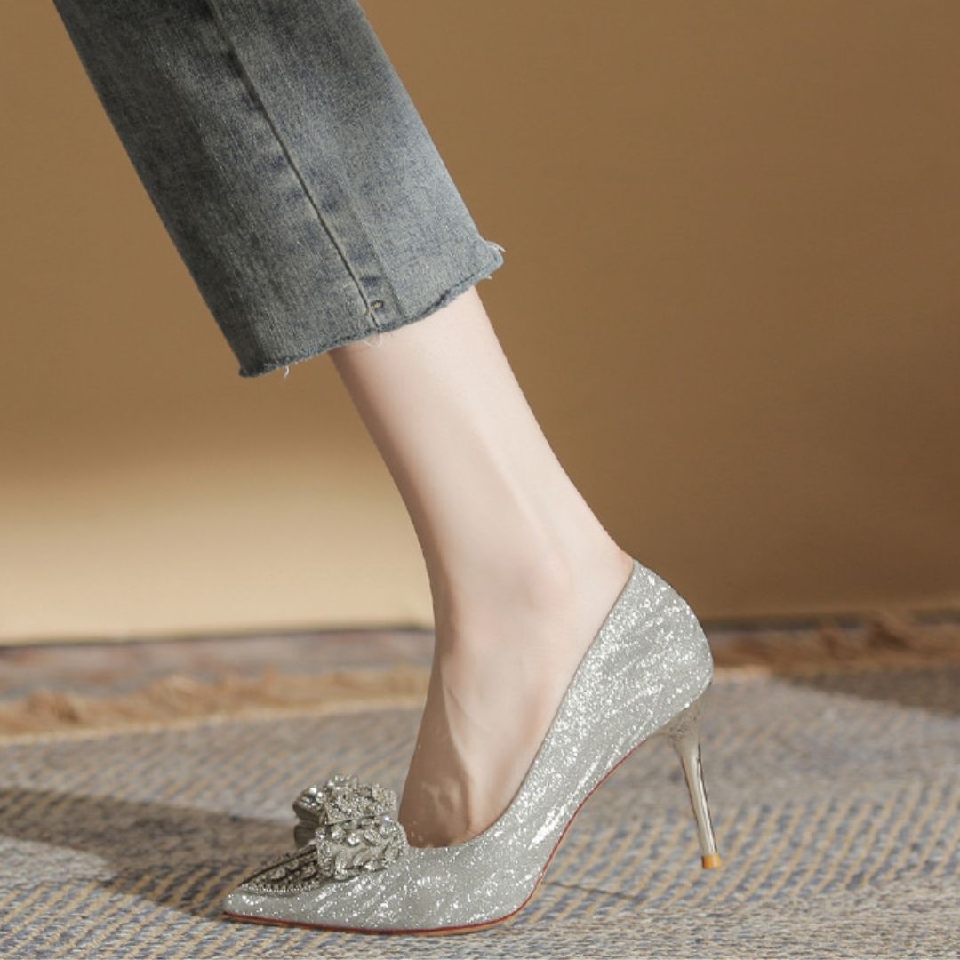 Shehzadi silver bridal heels styled for wedding reception