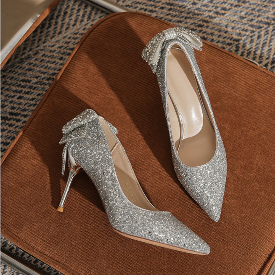 Anmol silver heels rhinestone French bow back detail